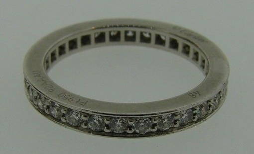 CLASSIC Cartier Platinum & Diamond Band with Original Box: DK Cartier Platinum & Diamond Band with Box · Wonderful band that is a necessity in your collection. · The weight is 3.9 grams. · The height is 1/8 of an inch. There are 0.52 points of