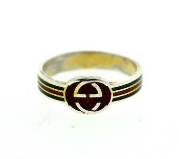 C.1970 STERLING SILVER ENAMEL GUCCI BAND RING STAMPED: N-UTO GUCCI STERLING SILVER BAND STAMPED WIDTH 1/4'' WEIGHT 2.4 G SIZE 7.0 Reserve: $320.00 Shipping: Domestic: Flat-rate of $45.99 to anywhere within the contiguous U.S. Int