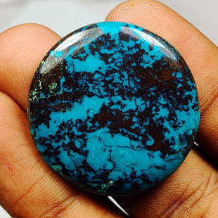 65.34 Ctw Natural Tibetian Blue Turquoise Round Cab: Title: 65.34 Ctw Natural Tibetian Blue Turquoise Round CabStone Clarity: OpaqueGemstone:Natural TurquoiseCarat Weights: 65.34Size/Dimensions: 34.00 x 34.00 x 6.90 mmAdditional Info:Round Cabochon /