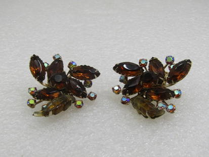 Vintage Brown & AB Rhinestone Clip Earrings Mid-Century: Vintage Brown Rhinestone Blossom Clip Earrings, Mid-Century, 1.5". Single blossom with tiered design with round and marquise root beer clear brown rhinestones with molded honey colored leaves accent