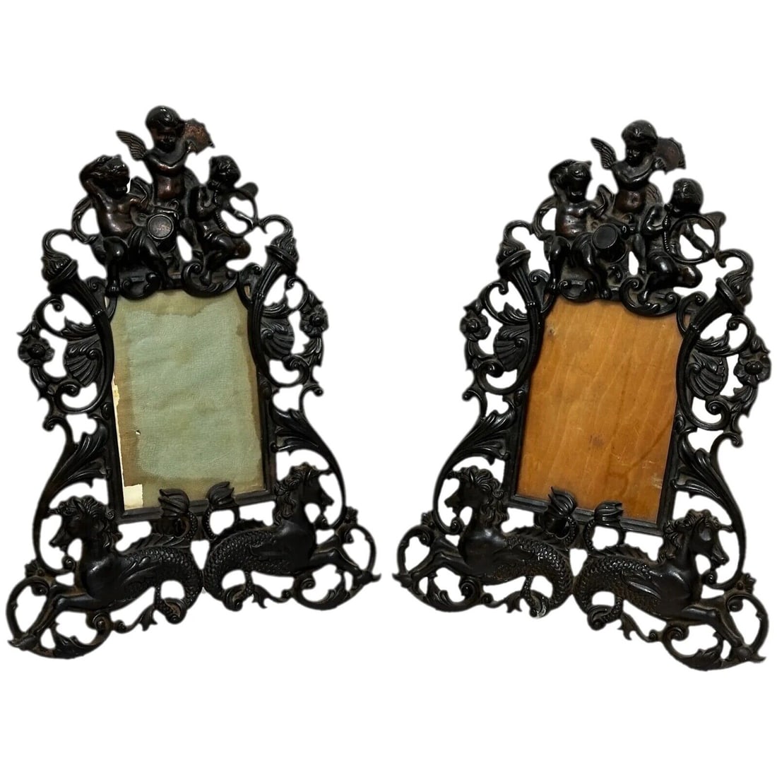 Pair Beautiful British Antique Art Nouveau Cast Iron Photo Picture Frames: Pair Beautiful British Antique Art Nouveau Cast Iron Photo Picture Frames. They have sumptious shape to them with Cherubs on top playing musical instruments, on the bottom are seas horses, running alo