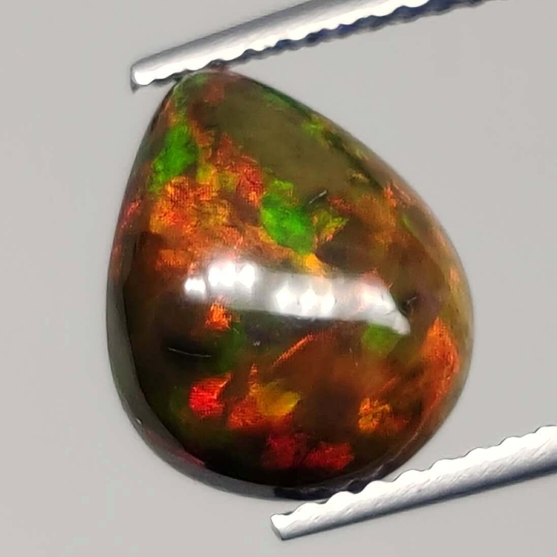 2.40 Ct "Play Of Colors" Natural Black Opal (1 of 5)