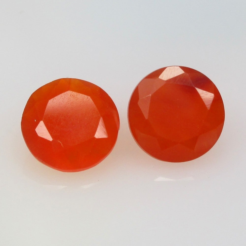 2.15 Ctw Natural Orange Carnelian Round Pair: No Reserve! Title: 2.15 Ctw Natural Orange Carnelian Round Pair Stone Clarity: Semi-Transparent Gemstone:Natural Carnelian Carat Weights: 2.15 Size/Dimensions: 7.20 x 7.20 x 4.40 mm / 2 Pc's Additiona