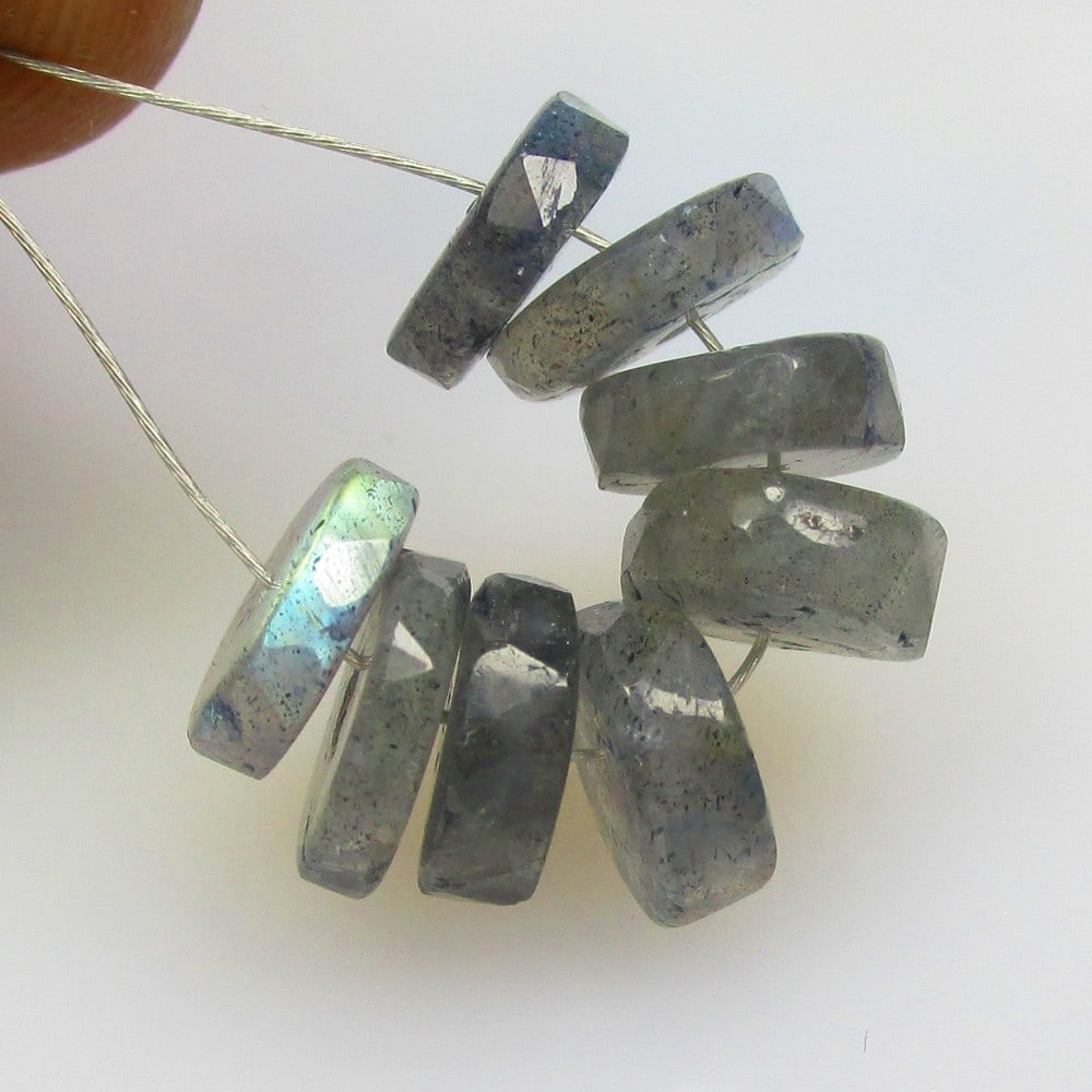 9.92 Ctw Natural 8 Labradorite Round Beads: No Reserve! Title: 9.92 Ctw Natural 8 Labradorite Round Beads Stone Clarity: Opaque Gemstone:Natural Labradorite Beads Carat Weights: 9.92 Size/Dimensions: 7.30 - 7.80 mm / 8 Pc's Additional Info:Exce