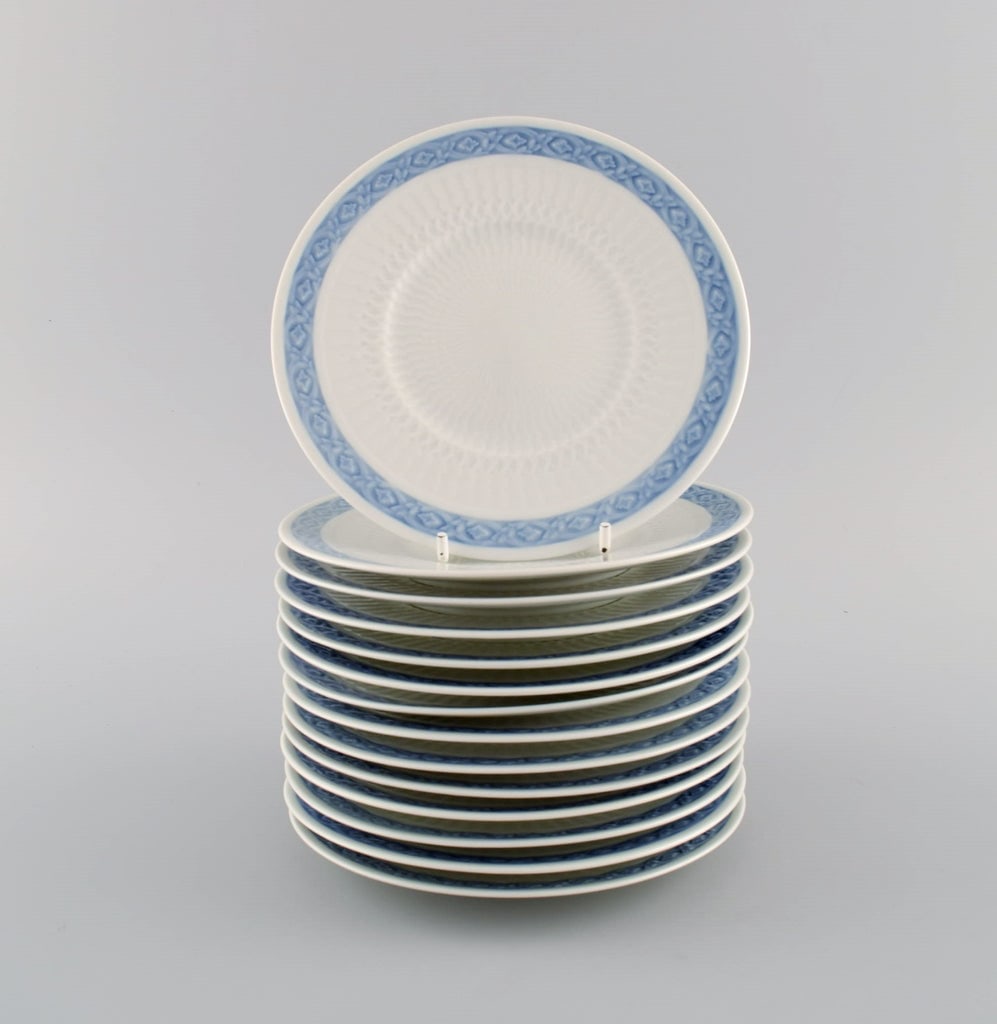 14 Royal Copenhagen Blue Fan side plates. 1960s. Model number 1212/1522. Designed by Arnold Krog in: 14 Royal Copenhagen Blue Fan side plates. 1960s. Model number 1212/1522. Designed by Arnold Krog in 1909. Diameter: 15.8 cm. In excellent condition. Stamped. 1st factory quality. Reserve: $329.00 Ship