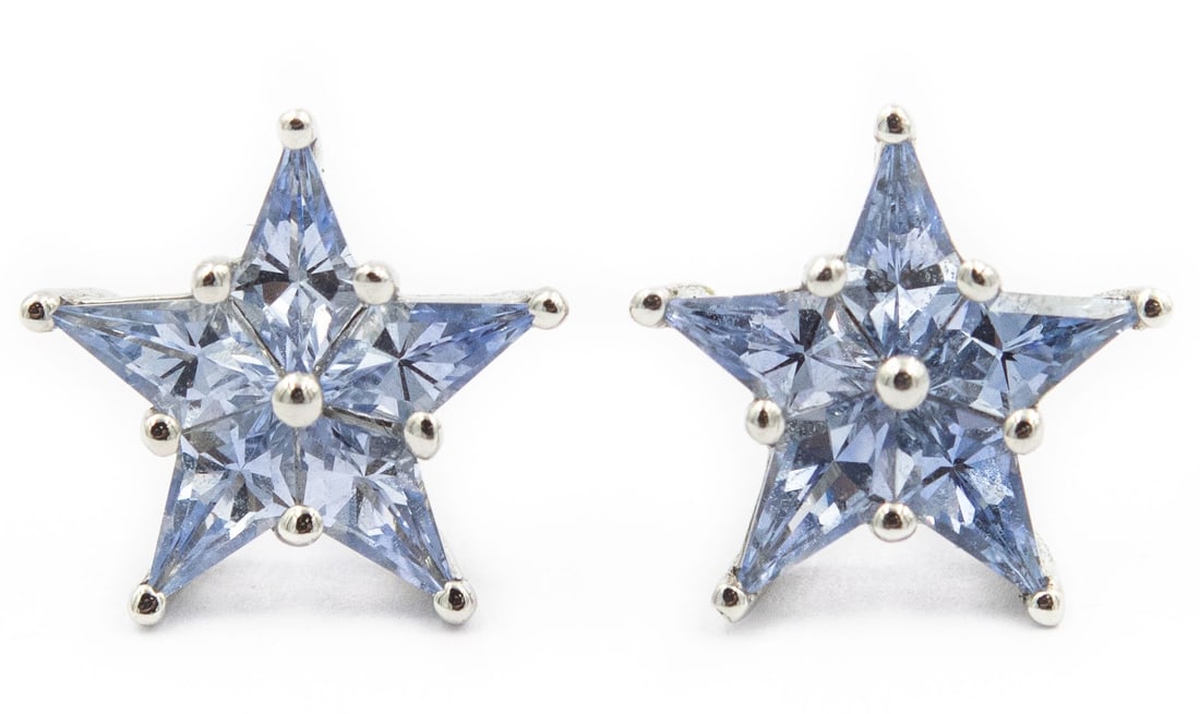 Estate Platinum and Star Sapphire Earrings by Tiffany & Co: Title: Estate Platinum and Star Sapphire Earrings by Tiffany & Co Details: Estate Platinum and Star Sapphire Earrings by Tiffany & Co; platinum; 10 calibre cut sapphires 2.00cts; Retail Price $2100 De