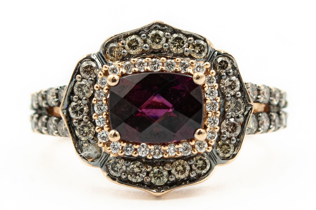 Estate Yellow Gold Garnet and Chocolate Diamond Ring by Levian: Title: Estate Yellow Gold Garnet and Chocolate Diamond Ring by Levian Details: Estate Yellow Gold Garnet and Chocolate Diamond Ring by Levian Stamp #KJR387RHBDD; 14k yellow gold; 3.90dwt; 48 diamonds 