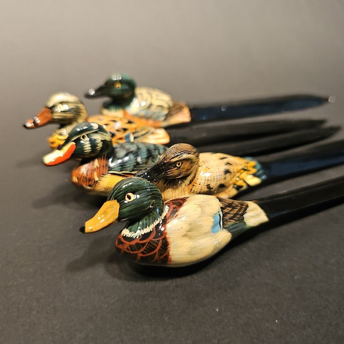 Lot of 5 Hand Painted Duck Decoy Letter Openers: lot of 5 as shown 8" long Well made duck letter openers, all hand painted as shown. Great for use or display in any early home decor Reserve: $15.00 Shipping: Domestic: Flat-rate of $9.00 to anywhere 