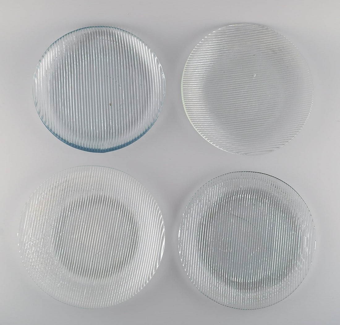 Per Lütken for Holmegaard. Four "Buffet" plates in mouth-blown art glass. 1980s.: Per Lütken for Holmegaard. Four "Buffet" plates in mouth-blown art glass. 1980s. Largest plate diameter: 27 cm. In excellent condition. Reserve: $189.00 Shipping: Domestic: Shipping rates are det