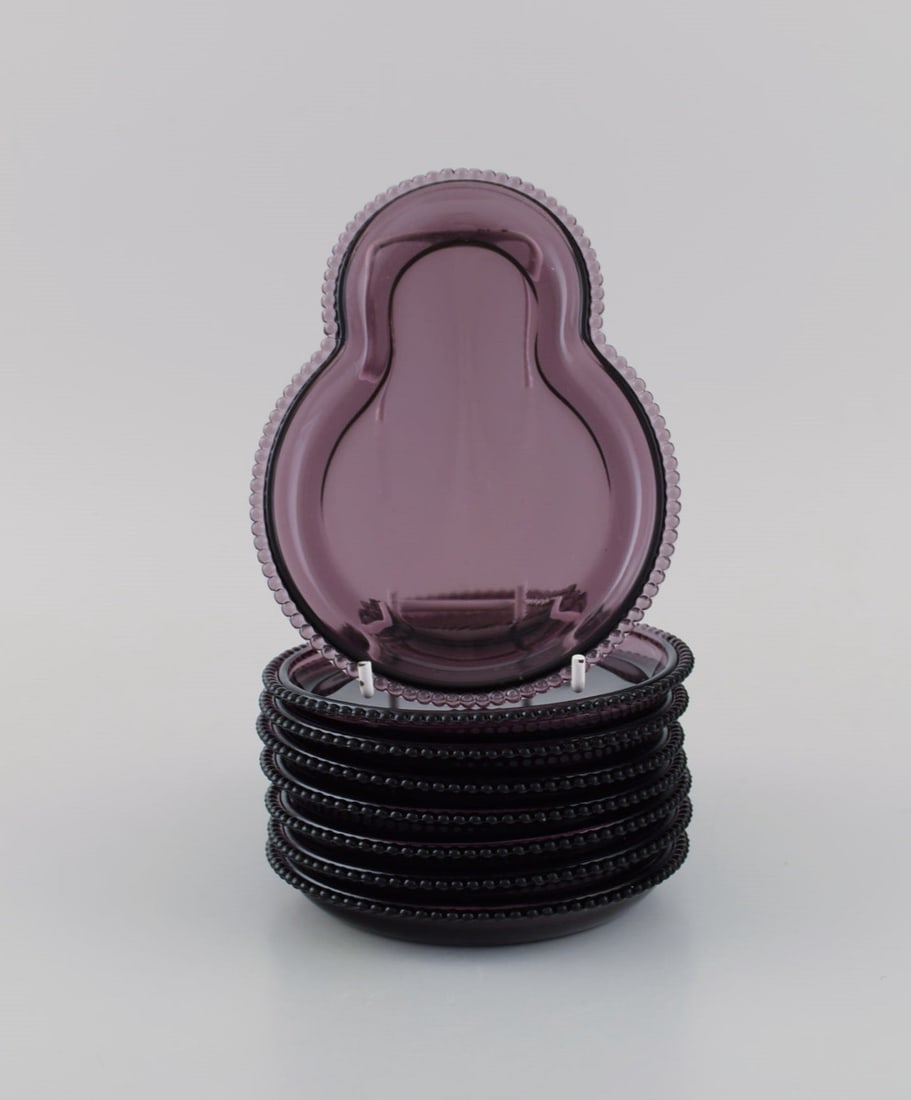 Scandinavian glass artist. Eight rare plates in purple art glass. 1960s / 70s.: Scandinavian glass artist. Eight rare plates in purple art glass. 1960s / 70s. Measures: 15.5 x 12 cm. In excellent condition. Reserve: $280.00 Shipping: Domestic: Shipping rates are determined by des