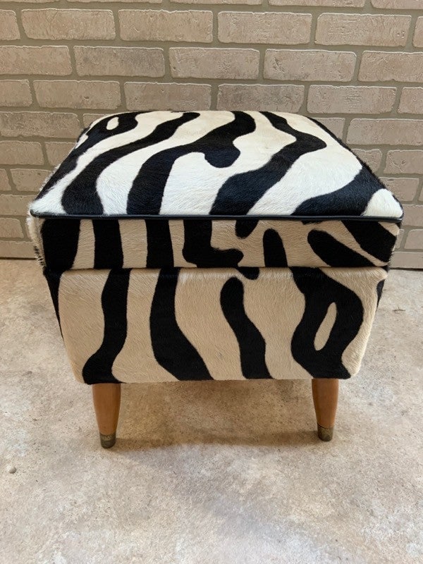 Hollywood Regency Storage Stool Newly Upholstered with Zebra Print Cow Hide: Hollywood Regency Storage Stool Newly Upholstered with Zebra Print Cow Hide Circa 1980 H 17" W 17" D 17" Great condition Please be aware that all the items are vintage and may have small defects of si