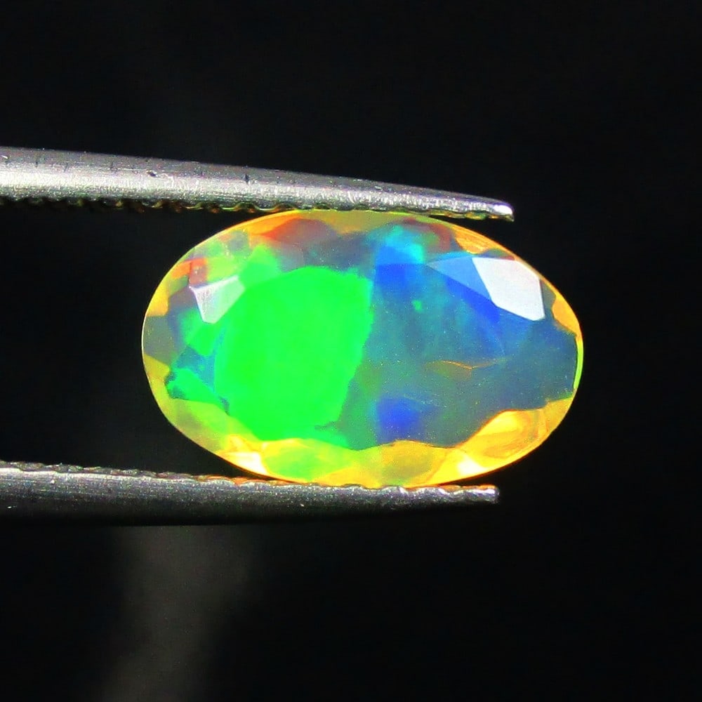 0.86 Ctw Natural Ethiopian Multicolor Opal Oval Cut: No Reserve! Title: 0.86 Ctw Natural Ethiopian Multicolor Opal Oval Cut Stone Clarity: Translucent Gemstone:Natural Opal Carat Weights: 0.86 Size/Dimensions: 9.90 x 6.30 x 3.00 mm Additional Info:Excel