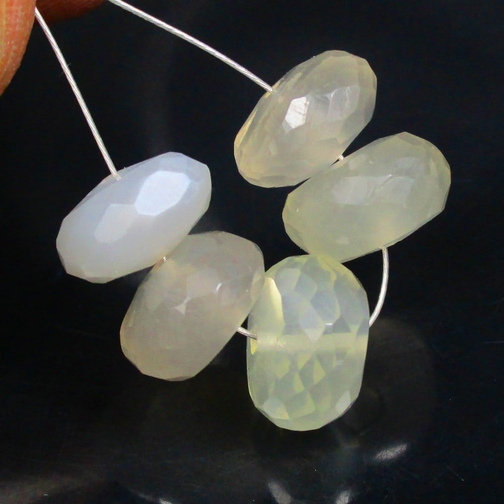 18.03 Ctw Natural 5 Drilled Moonstone Round Beads: No Reserve! Title: 18.03 Ctw Natural 5 Drilled Moonstone Round Beads Stone Clarity: Semi-Transparent Gemstone:Natural Moonstone Beads Carat Weights: 18.03 Size/Dimensions: 9.20 to 9.90 mm / 5 PC's Add
