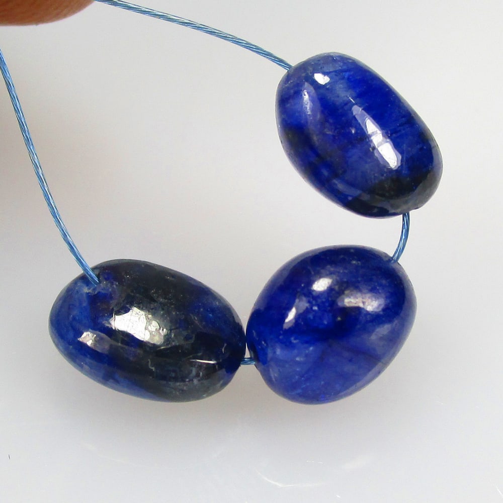 9.60 Ctw Diffusion Sapphire Dumble Beads: No Reserve! Title: 9.60 Ctw Diffusion Sapphire Dumble Beads Stone Clarity: Transparent Gemstone:Natural Sapphire Beads Carat Weights: 9.6 Size/Dimensions: 6.30 - 6.80 mm / 3 Pc's Additional Info:Drill