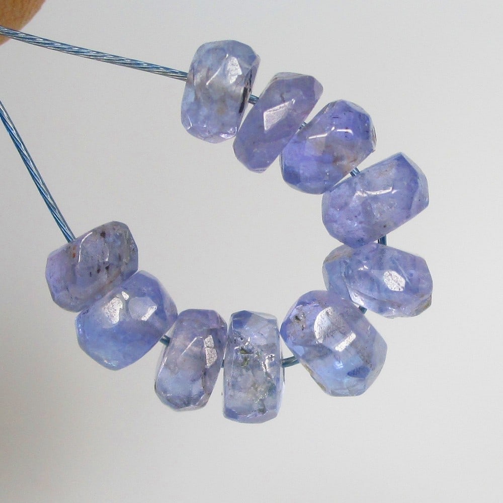 4.20 Ctw Natural Iolite Round Beads: No Reserve! Title: 4.20 Ctw Natural Iolite Round Beads Stone Clarity: Semi-Transparent Gemstone:Natural Iolite Beads Carat Weights: 4.2 Size/Dimensions: 3.80 - 4.50 mm / 10 Pc's Additional Info:Very G