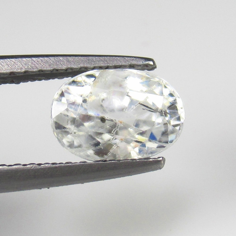 Natural White Zircon - 2.49 Ct: No Reserve! Title: Natural White Zircon - 2.49 Ct Origin: Combodia Weight:2.49 Size/Dimnseions: 8.3 x 5.7 x 5 mm Shipping: Domestic: Flat-rate of $7.00 to anywhere within the contiguous U.S. Inte