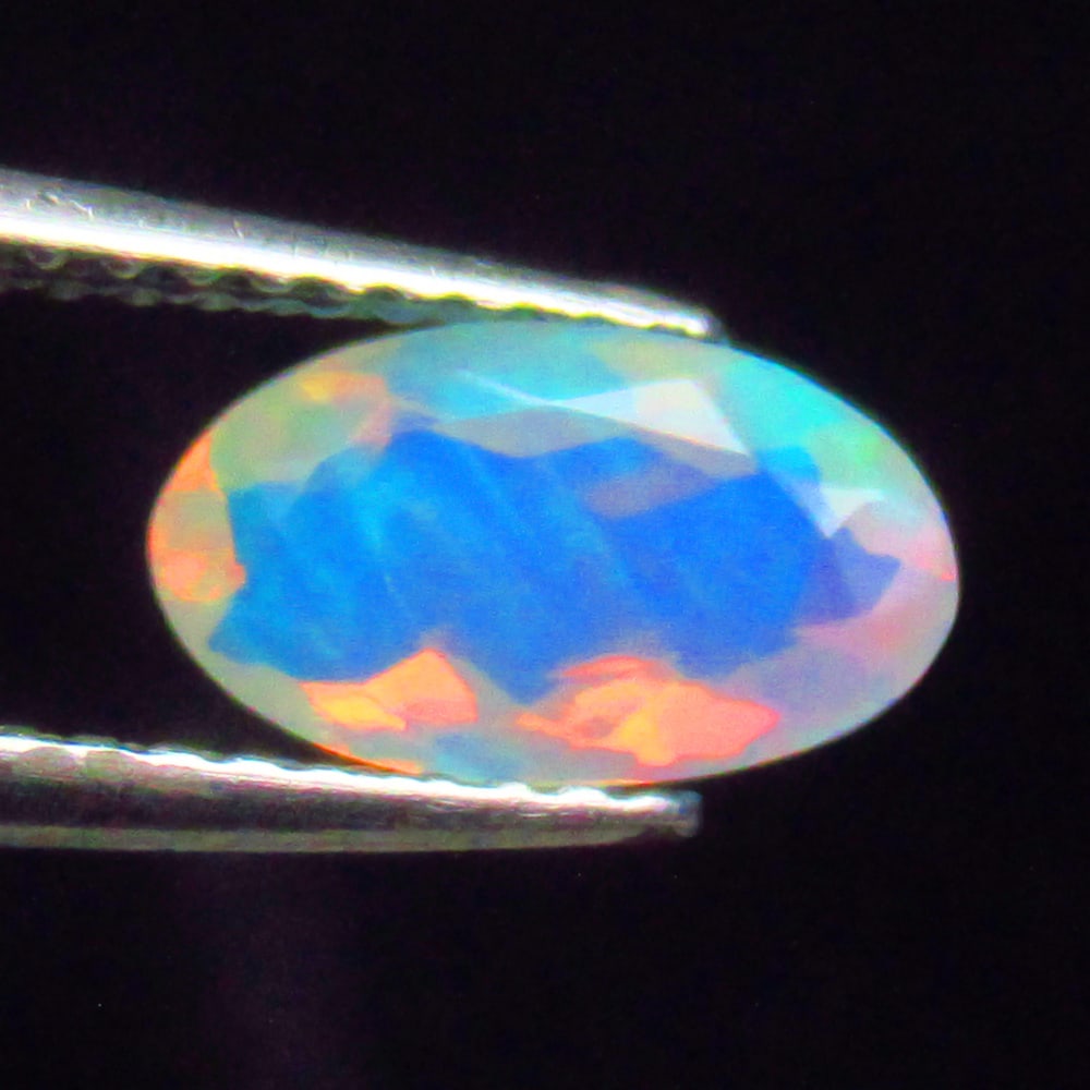 0.89 Ctw Natural Ethiopian Multicolor Opal Oval Cut: No Reserve! Title: 0.89 Ctw Natural Ethiopian Multicolor Opal Oval Cut Stone Clarity: Translucent Gemstone:Natural Opal Carat Weights: 0.89 Size/Dimensions: 9.30 x 5.40 x 4.00 mm Additional Info:Excel