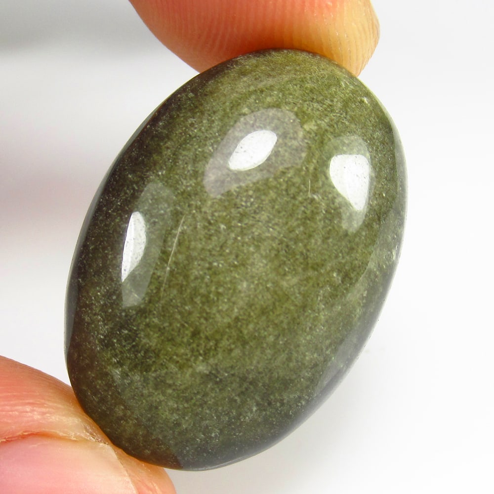 24.31 Ct - Natural Obsidian: No Reserve! Title: 24.31 Ct - Natural Obsidian Description: Gemstone Gemstones: Obsidian Carat: 24.31 Size/Dimensions:28.0 x 19.0 x 7.1 mm Additional Info:Pieces : 1 No's / Shape : Oval Cab / Color :