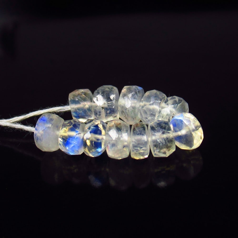 Natural Blue Moonstone Beads - 7.71 Ct: No Reserve! Title: Natural Blue Moonstone Beads - 7.71 Ct Origin: India Weight:7.71 Size/Dimnseions: 5.0 - 5.5 mm Shipping: Domestic: Flat-rate of $7.00 to anywhere within the contiguous U.S. Int
