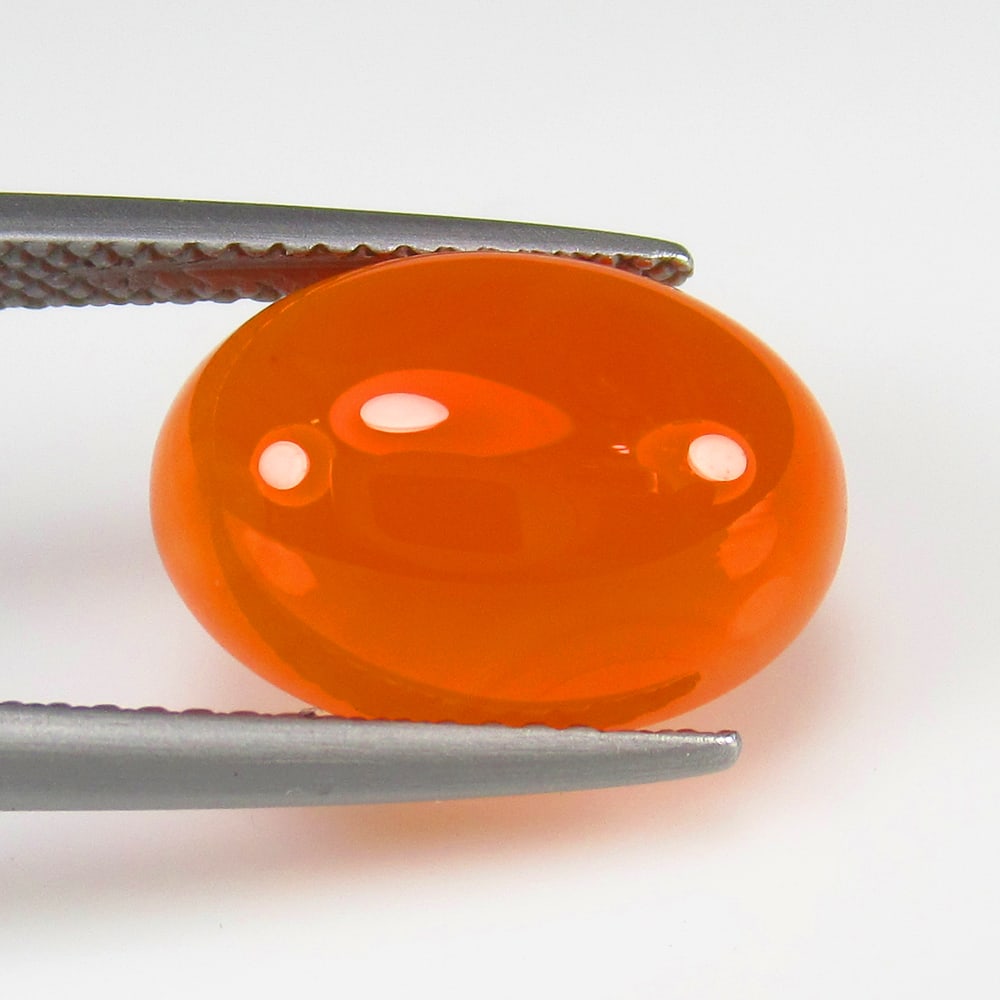 5.53 Ct - Natural Carnelian: No Reserve! Title: 5.53 Ct - Natural Carnelian Description: Gemstone Gemstones: Carnelian Carat: 5.53 Size/Dimensions:13.9 x 10.0 x 5.3 mm Shipping: Domestic: Flat-rate of $7.00 to anywhere withi