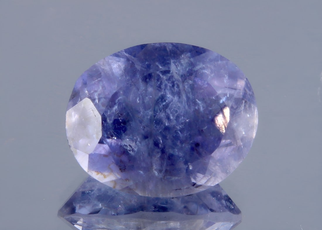 Gorgeous " Natural Iolite Violet " 2.34 Cts Natural Iolite: No Reserve! Title: Gorgeous " Natural Iolite Violet " 2.34 Cts Natural Iolite Description: Gemstone : Natural Iolite Shape and Cut : OVal Cut Weight : 2.34 Carats Measurements : 10x8 mm, Color : Violi
