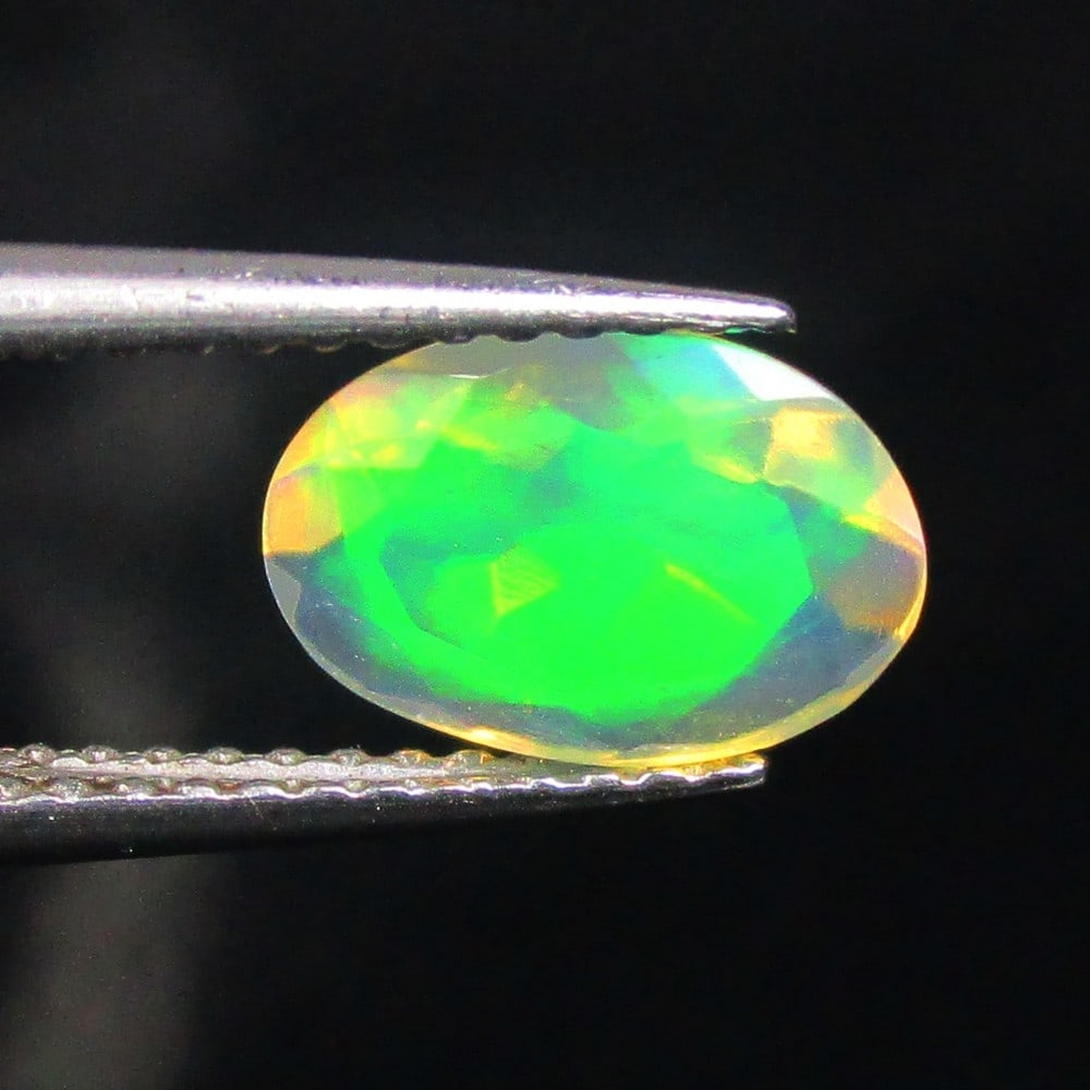 0.72 Ctw Natural Ethiopian Multicolor Opal Oval Cut: No Reserve! Title: 0.72 Ctw Natural Ethiopian Multicolor Opal Oval Cut Stone Clarity: Translucent Gemstone:Natural Opal Carat Weights: 0.72 Size/Dimensions: 9.00 x 6.30 x 3.30 mm Additional Info:Excel