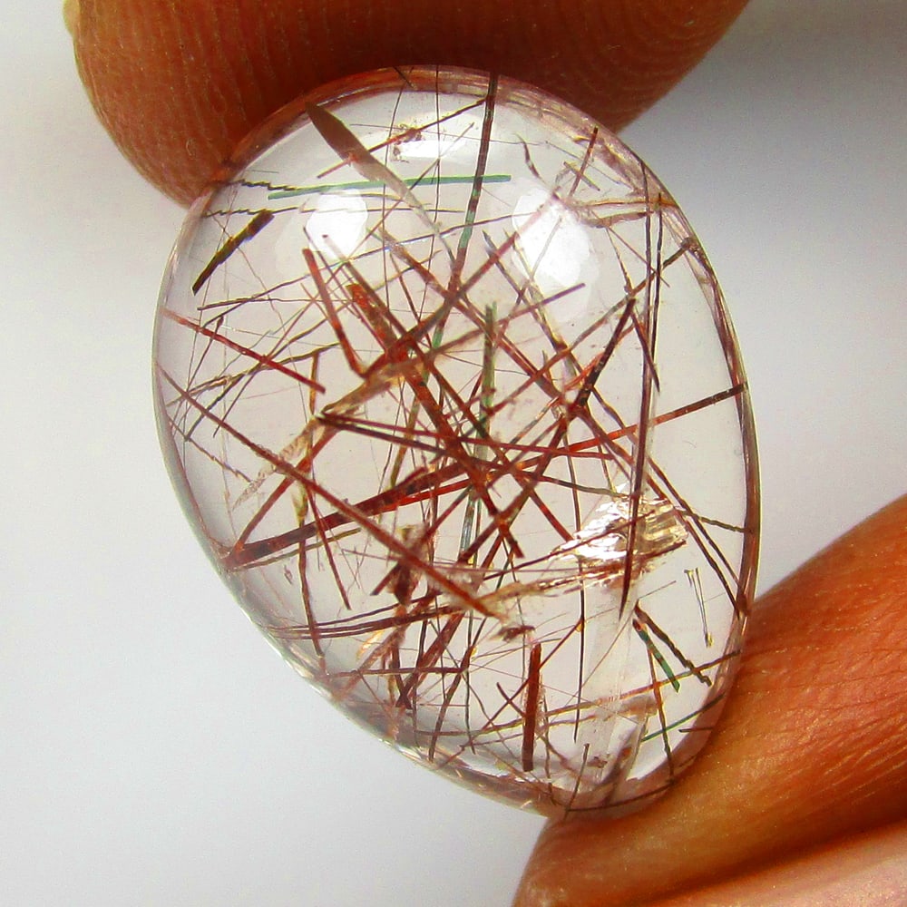 9.60 Ctw Natural Rutile Quartz Pear Cab: No Reserve! Title: 9.60 Ctw Natural Rutile Quartz Pear Cab Stone Clarity: Transparent Gemstone:Natural Rutile Quartz Carat Weights: 9.6 Size/Dimensions: 16.90 x 12.60 x 6.70 mm Additional Info:Excelle