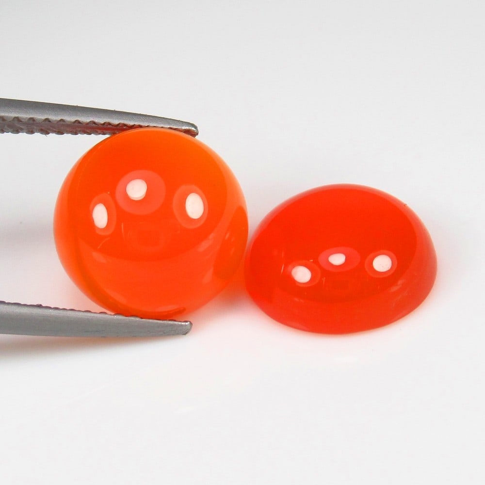 Natural Carnelian Pair - 9.39 Ct: No Reserve! Title: Natural Carnelian Pair - 9.39 Ct Origin: Brazil Weight:9.39 Size/Dimnseions: 11.1 x 11.1 x 4.9 mm Shipping: Domestic: Flat-rate of $7.00 to anywhere within the contiguous U.S. 