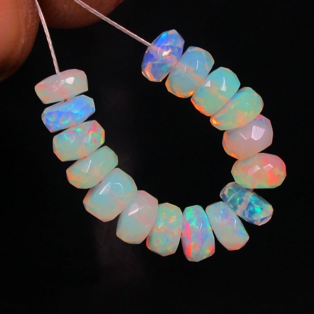 4.10 Ctw Natural 16 Ethiopian Drilled Faceted Fire Opal Beads: No Reserve! Title: 4.10 Ctw Natural 16 Ethiopian Drilled Faceted Fire Opal Beads Stone Clarity: Transparent Gemstone:Natural Faceted Fire Opal Beads Carat Weights: 4.1 Size/Dimensions: 4.50 to 4.70 mm