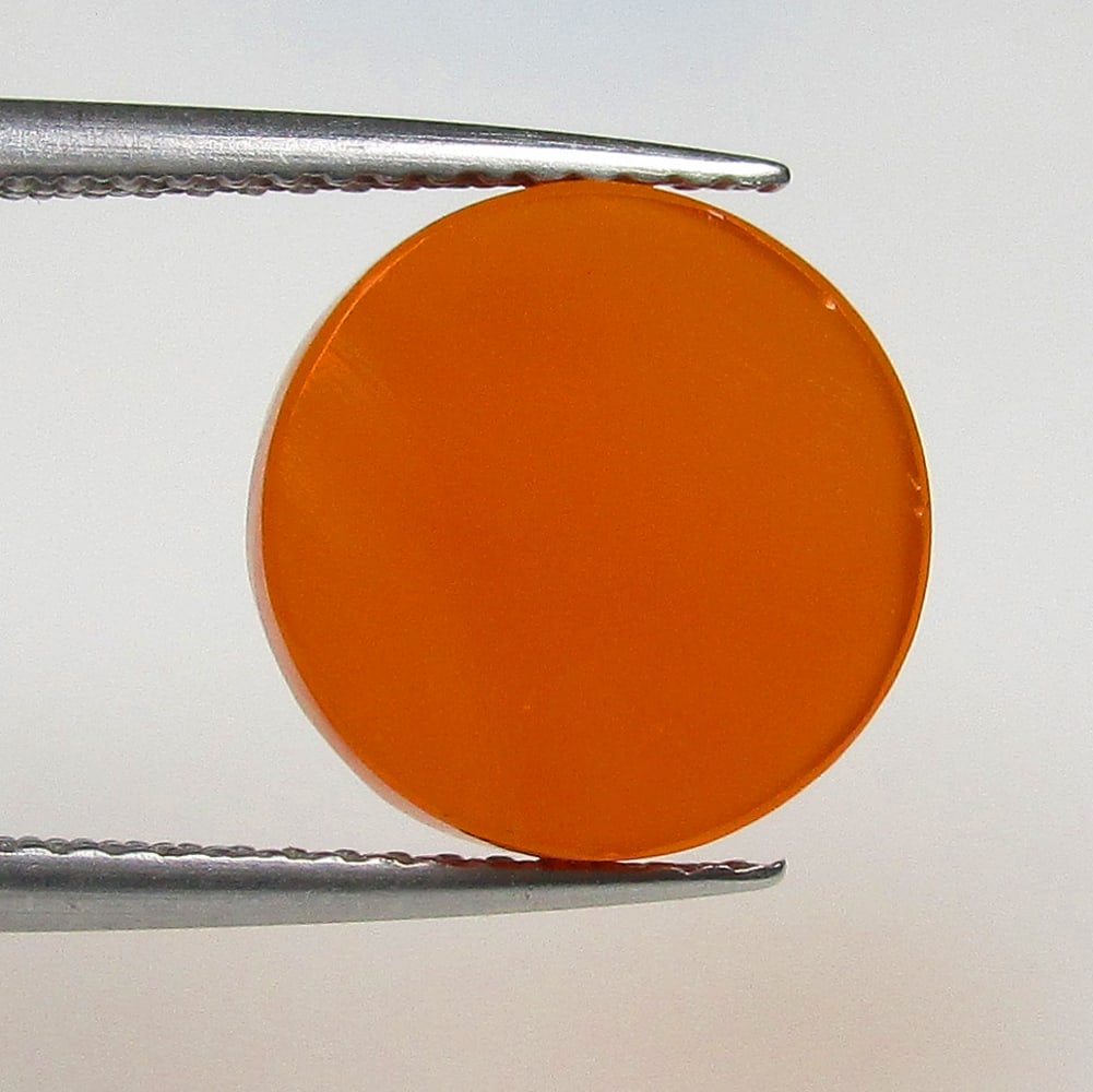 2.76 Ctw Natural Orange Carnelian Round Cab: No Reserve! Title: 2.76 Ctw Natural Orange Carnelian Round Cab Stone Clarity: Semi-Transparent Gemstone:Natural Carnelian Carat Weights: 2.76 Size/Dimensions: 11.10 x 11.10 x 2.50 mm Additional Info:R