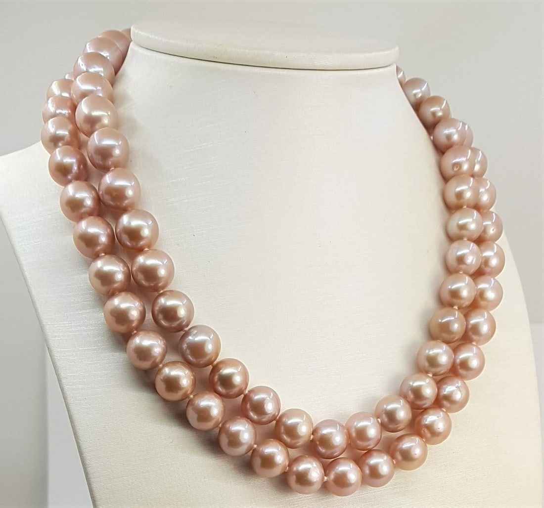 10x11mm Pink Edison Freshwater Pearls - 925 Silver - Necklace: Title: 10x11mm Pink Edison Freshwater Pearls - 925 Silver - Necklace Description: Most freshwater pearls are nucleated by tissue, but Edison cultured pearls are nucleated with beads, exactly as saltwa