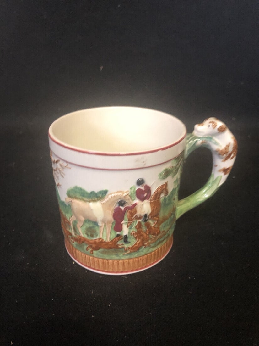 Wedgwood Majolica Dog Handle Mug: It measures 3 1/4” x 4 1/2” and is marked. It has no chips, cracks or repairs Shipping: Domestic: Flat-rate of $15.00 to anywhere within the contiguous U.S. International: Foreign shipping