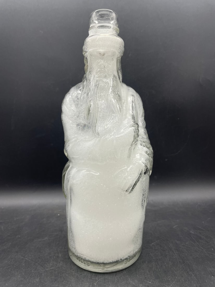 POLAND MINERAL SPRING WATER CLEAR FIGURAL BOTTLE SHAPED LIKE MOSES or SANTA CLAUS: Title: POLAND MINERAL SPRING WATER CLEAR FIGURAL BOTTLE SHAPED LIKE MOSES or SANTA CLAUS Date/Period: unknown Materials: glass Dimensions: approx. 10.75 x 4 Additional Information: Figural bottle shap