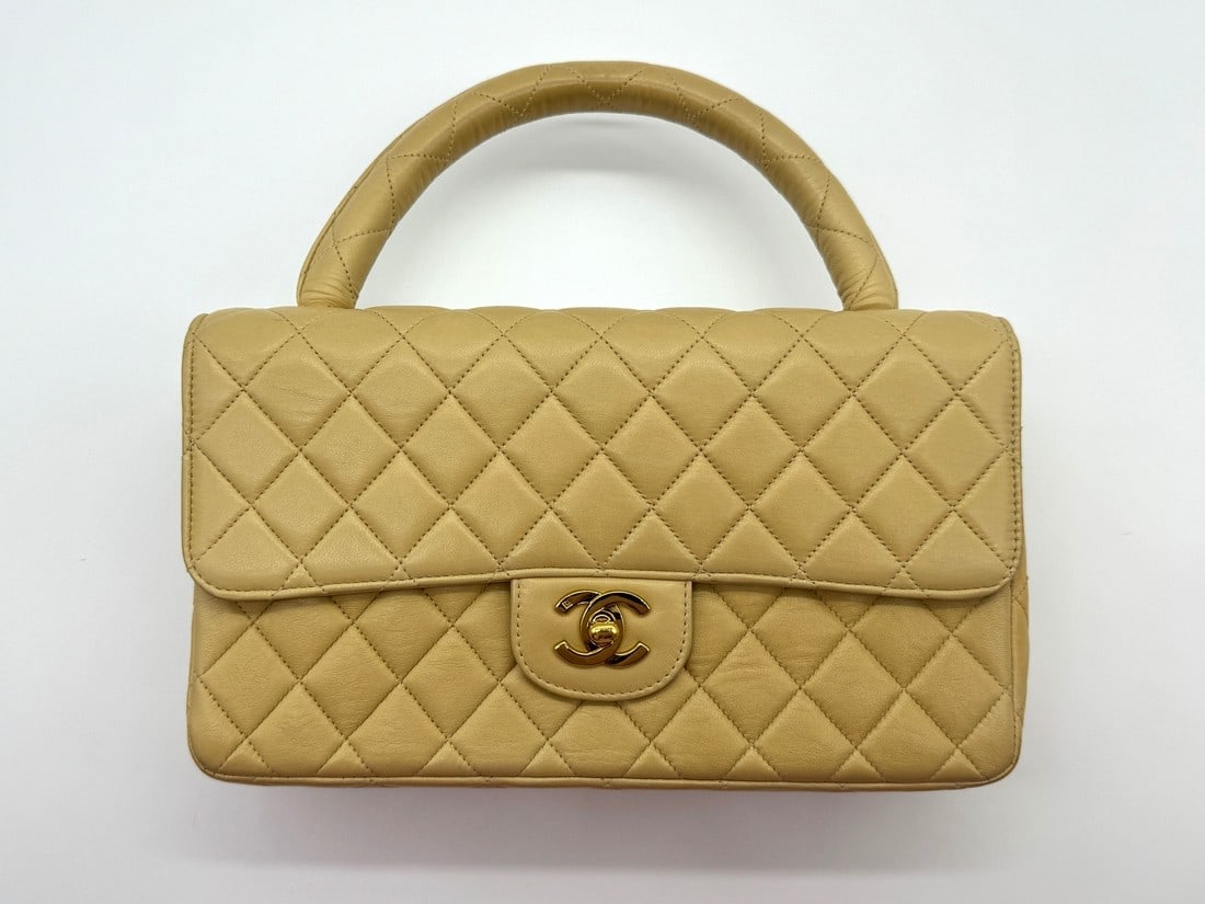 RARE Chanel 1994 Kelly Vintage Parent Child Bag Flap Set Beige 24k GHW: Title: RARE Chanel 1994 Kelly Vintage Parent Child Bag Flap Set Beige 24k GHW Description: RARE vintage CHANEL Kelly “parent-child” or “twin” bag in a rich beige tan lambskin l