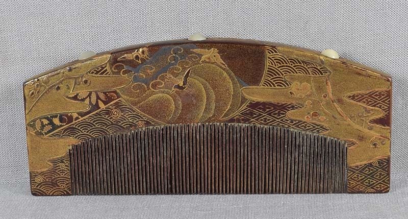 19c Japanese lacquer wood KUSHI hair COMB birds prunus brocade: Late Meiji period (1890s to 1912) Japanese wooden kushi (hair comb) with lacquer decoration of small birds in flight among flowering prunus branches, all on different brocade patterns, design continui