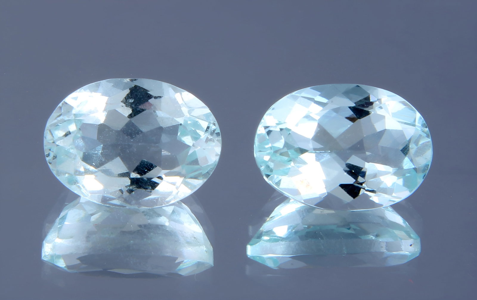 Fabulous " Natural Aquamarine " 1.80 Cts Natural Aquamarine Pair: No Reserve! Title: Fabulous " Natural Aquamarine " 1.80 Cts Natural Aquamarine Pair Additional Info: Gemstone : Natural Aquamarine Origin : Australia Weight : 1.80 carats Dimensions : 7x5 mm Shape : O