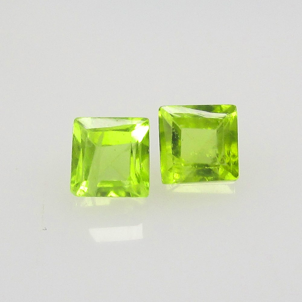 1.11 Ctw Natural Pakistan Peridot Square Pair: No Reserve! Title: 1.11 Ctw Natural Pakistan Peridot Square Pair Stone Clarity: VVS Gemstone:Natural Peridot Carat Weights: 1.11 Size/Dimensions: 4.10 x 4.10 x 3.30 mm / 2 Pc's Additional Info:Top Cla