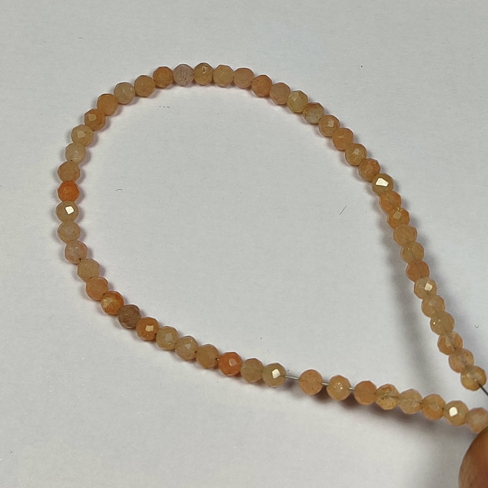 10.29 Ctw Natural 55 Drilled Moonstone Round Cut Beads: No Reserve! Title: 10.29 Ctw Natural 55 Drilled Moonstone Round Cut Beads Stone Clarity: Semi-Transparent Gemstone:Natural Moonstone Beads Carat Weights: 10.29 Size/Dimensions: 3.20 to 3.30 mm / 55 PC