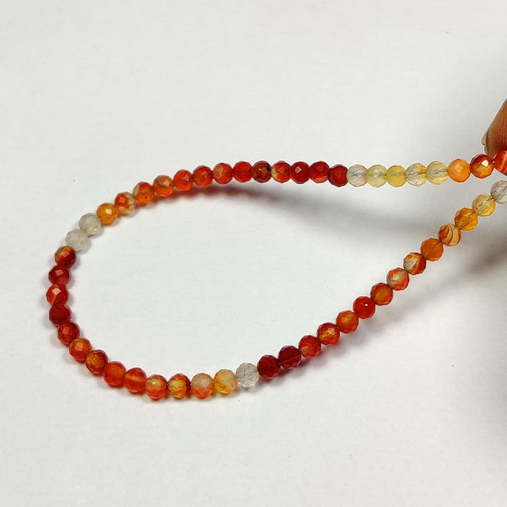 10.06 Ctw Natural Carnelian Round Beads: No Reserve! Title: 10.06 Ctw Natural Carnelian Round Beads Stone Clarity: Semi-Transparent Gemstone:Natural Carnelian Beads Carat Weights: 10.06 Size/Dimensions: 3.10 - 3.30 mm / 51 Pc's Additional In