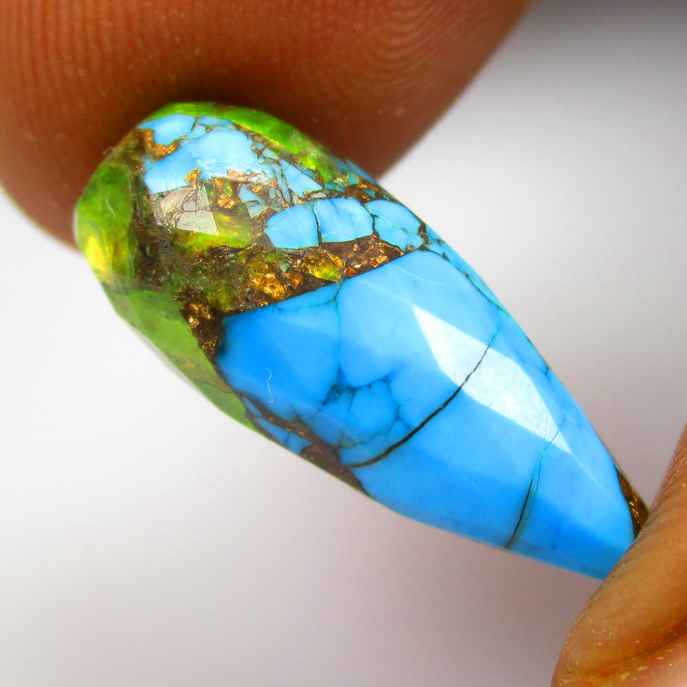 8.79 Ctw Natural Compsoite Howlite Pear Drop: No Reserve! Title: 8.79 Ctw Natural Compsoite Howlite Pear Drop Stone Clarity: Opaque Gemstone:Natural Howlite Turquoise Carat Weights: 8.79 Size/Dimensions: 20.10 x 8.20 x 8.20 mm Additional Info:Exc