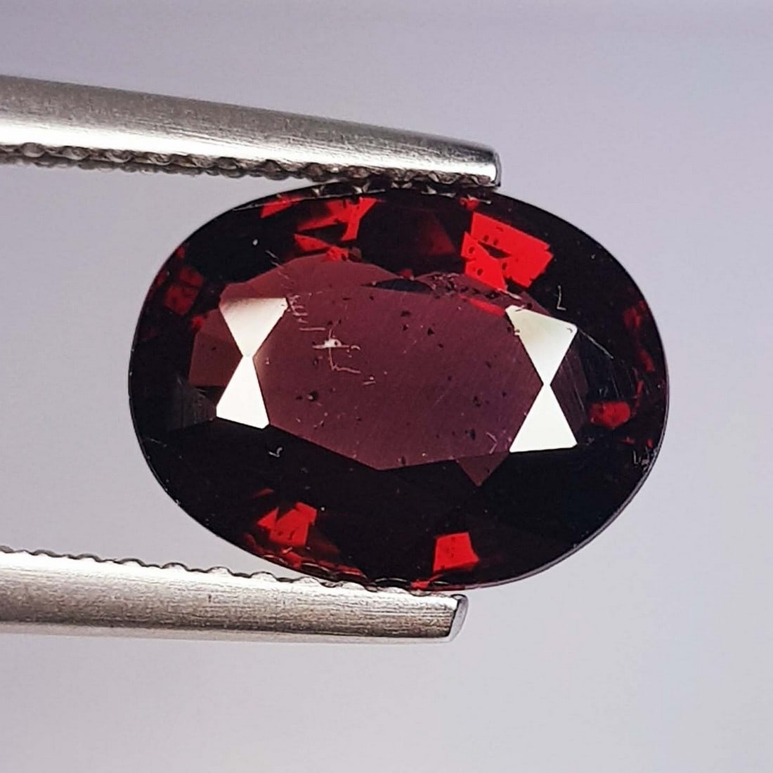 4.11 ctz" Beautiful Purple Pink Gem" Natural Rhodolite Garnet: No Reserve! Title: 4.11 ctz" Beautiful Purple Pink Gem" Natural Rhodolite Garnet Color/Clarity: Purple Pink / IF-VVS Gemstone: Rhodolite Garnet Carat Weights: 4.11 Size: 10.60 x 8.20 x 5.00 Additional