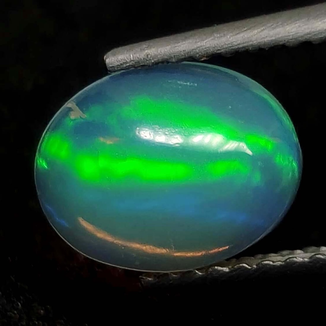 0.75 Ct Natural Ethiopian Fire Opal: No Reserve! Title: 0.75 Ct Natural Ethiopian Fire Opal Description: Gemstones: Natural Fire Opal Carat Weights: 0.75 ct Size/Dimensions: 8.70 X 6.80 mm Treatment: No Materials &Techniques:Opal Shippin