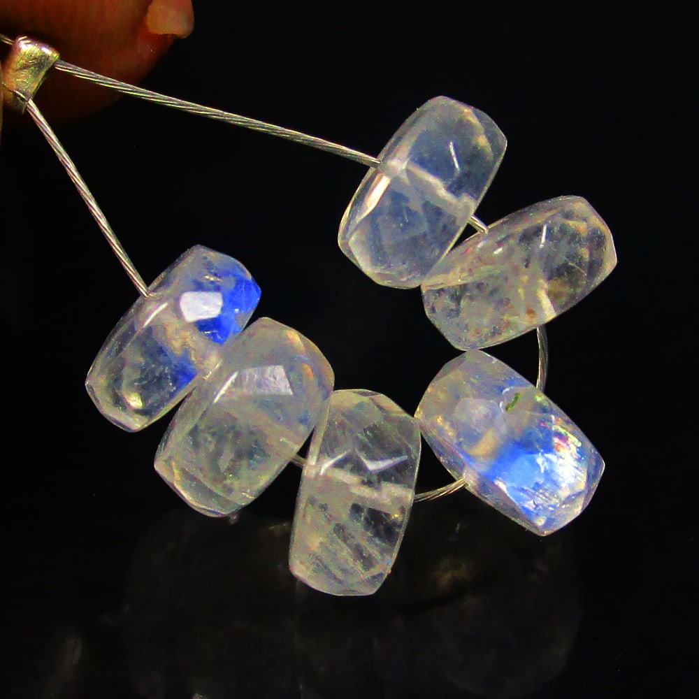 7.09 Ctw Natural 6 Drilled Blue Moonstone Round Beads: No Reserve! Title: 7.09 Ctw Natural 6 Drilled Blue Moonstone Round Beads Stone Clarity: Transparent Gemstone:Natural Blue Moonstone Beads Carat Weights: 7.09 Size/Dimensions: 6.40 to 6.60 mm / 6 PC's 