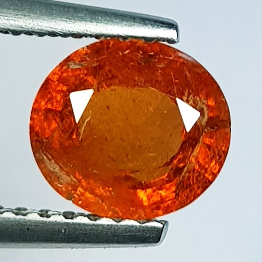 1.51 ctz" Beautiful Fanta Orange " Natural Spessartite Garnet: No Reserve! Title: 1.51 ctz" Beautiful Fanta Orange " Natural Spessartite Garnet Color/Clarity: Orange / VS Gemstone: Garnet Carat Weights: 1.51 Size: 7.20 x 6.50 x 4.00 Additional Information: Oval /