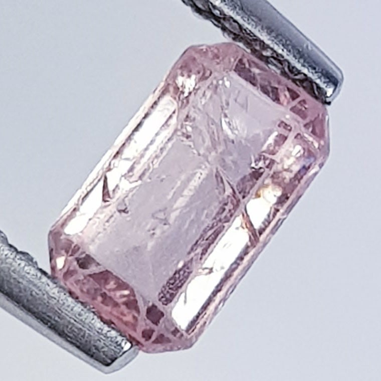0.79 ctz " Collective Gem " Natural Mined Spinel: No Reserve! Title: 0.79 ctz " Collective Gem " Natural Mined Spinel Color/Clarity: Orange / VVS-VS Gemstone: Spinel Carat Weights: 0.79 Size: 7.20 x 4.00 x 2.50 Additional Information: Octagon / Burma