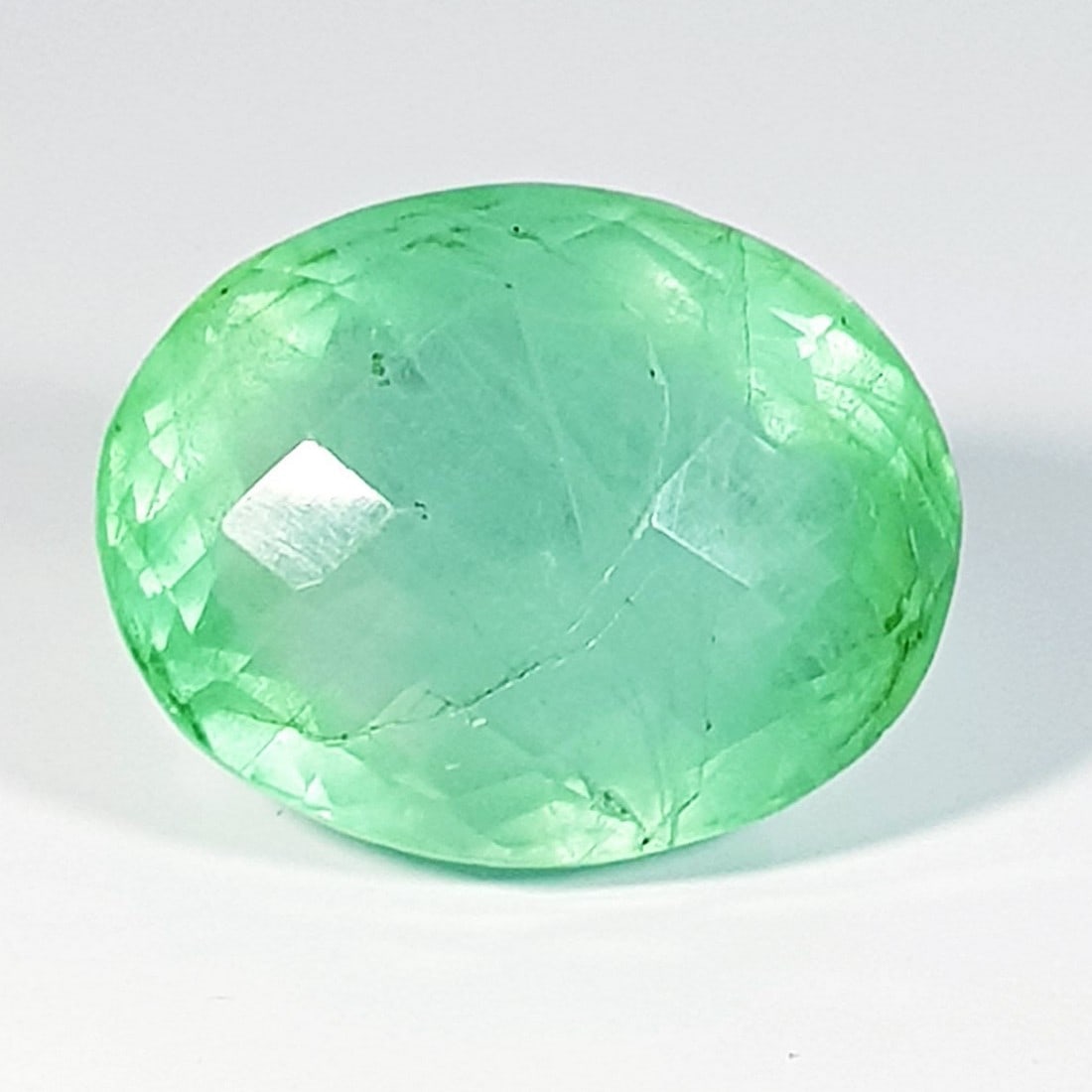 59.29 Ctz Fine Colombian Green Natural Fluorite: No Reserve! Title: 59.29 Ctz Fine Colombian Green Natural Fluorite Color/Clarity: Green / VS Gemstone: Fluorite Carat Weights: 59.29 Size: 25.09 x 19.90 x 16.35 Additional Information: Oval / Brazil S