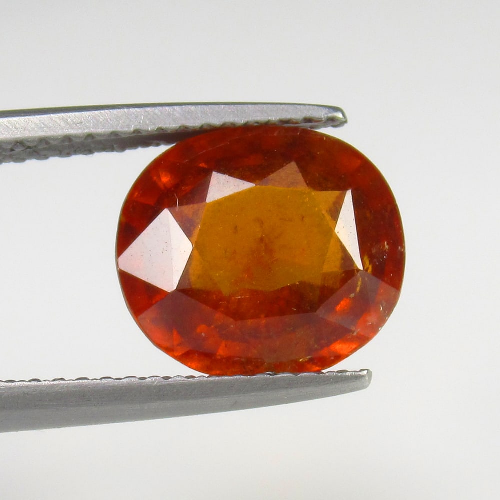4.95 Ct Natural Hessonite Garnet: No Reserve! Title: 4.95 Ct Natural Hessonite Garnet Description: Gemstone Gemstones: Garnet Carat Weights: 4.95 Size/Dimensions:10.6 x 9.5 x 6.0 mm Additional Info:Pieces - 1 / Shape - Oval Cut / Orig