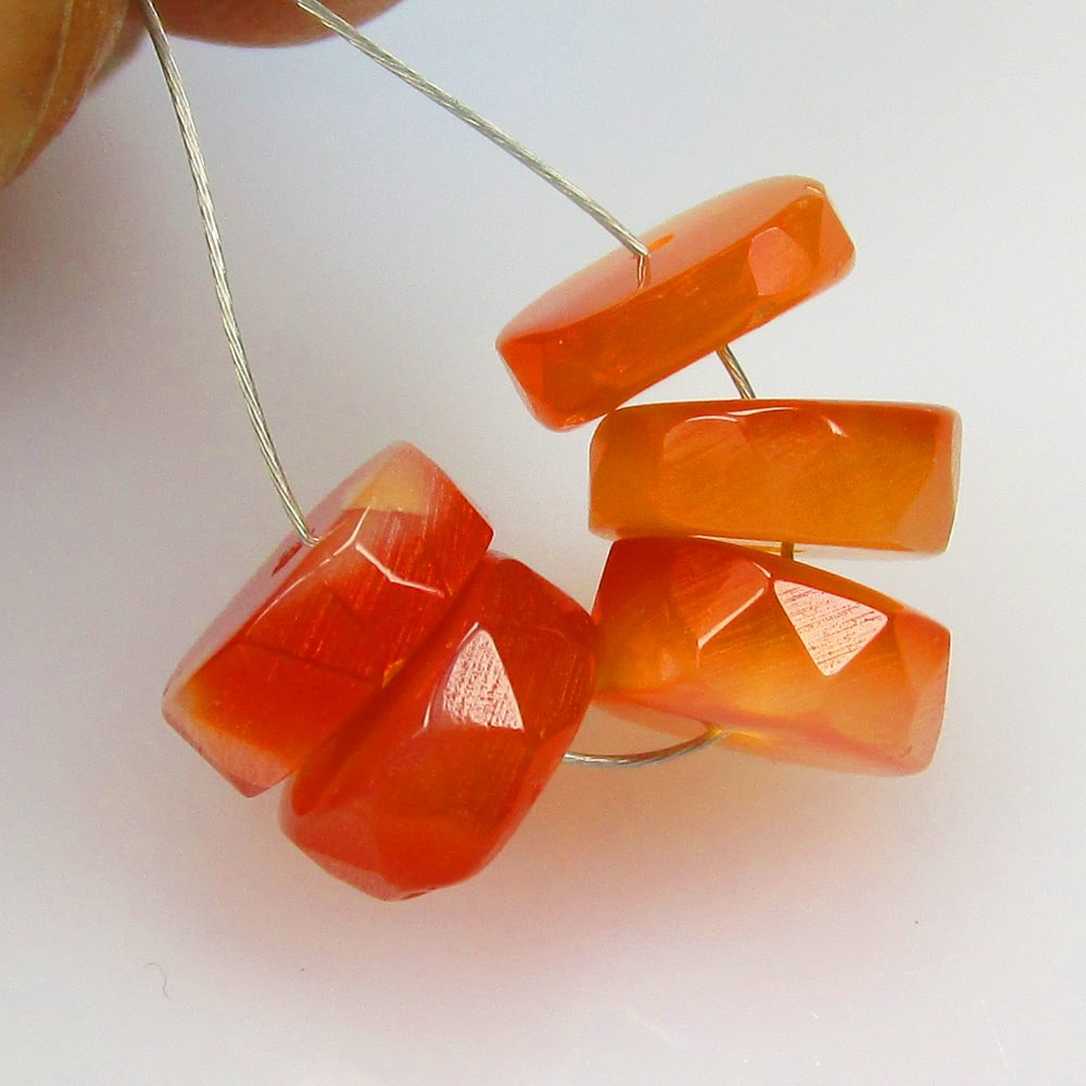 9.91 Ctw Natural 5 Drilled Orange Carnelian Round Beads: No Reserve! Title: 9.91 Ctw Natural 5 Drilled Orange Carnelian Round Beads Stone Clarity: Semi-Transparent Gemstone:Natural Carnelian Beads Carat Weights: 9.91 Size/Dimensions: 7.90 - 8.20 mm / 5 Pc's