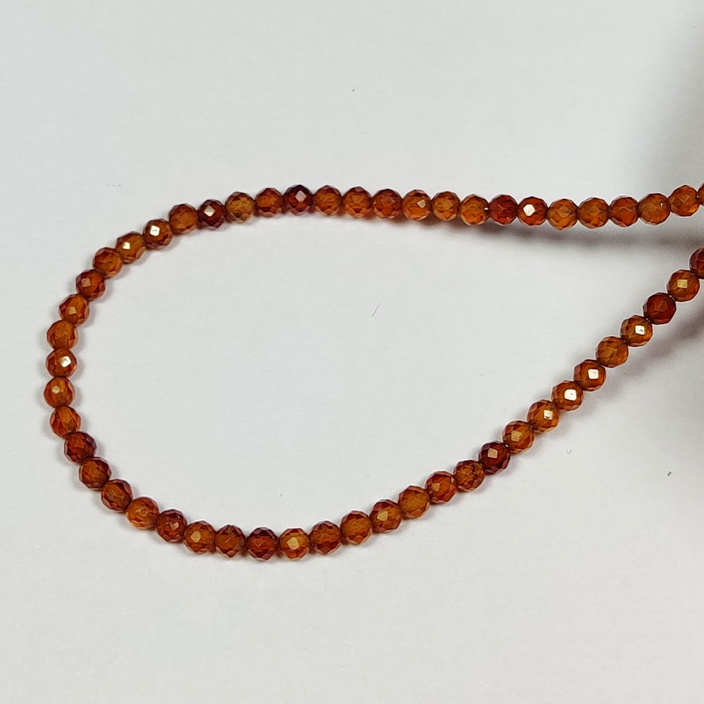 14.07 Ctw Natural 53 Hessonite Garnet Round Cut Beads: No Reserve! Title: 14.07 Ctw Natural 53 Hessonite Garnet Round Cut Beads Stone Clarity: Transparent Gemstone:Natural Hessonite Garnet Beads Carat Weights: 14.07 Size/Dimensions: 3.10 - 3.20 mm / 53 Pc