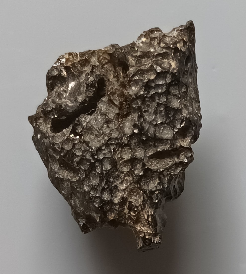 Philippinite Tektite - From Meteorite Impact: Title: Philippinite Tektite - From Meteorite Impact Origin: Anda, Cabarruyan Isl. Pangasinan, Luzon, Philippines Size: 2x1.7x1.2 cm / 3.62 gram Description: pyramidal & deeple pitted phillipinite tekt